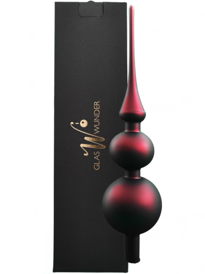 Christbaumspitze aus Glas mit 31cm Durchmesser in einem dunklen Rotton vor einer schwarzen Verpackung mit goldenem GlasWunder Logo